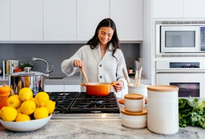Participant practicing kitchen and daily living routines with instructor